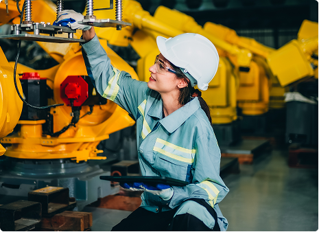 Supervisor and technician reviewing an inspection on a tablet on the plant floor